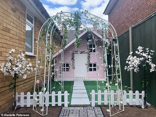 The homeowner picked up two bits of fencing from Homebase for £6.99 each and spray painted them white. Pictured, after the transformation