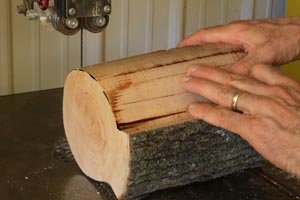 Create two ends from center piece of bird feeder using a band saw.