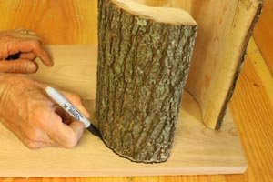 Create end pieces for the bird feeder using cedar.