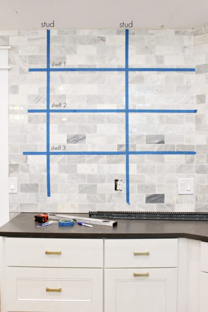 How to install floating shelves over tile