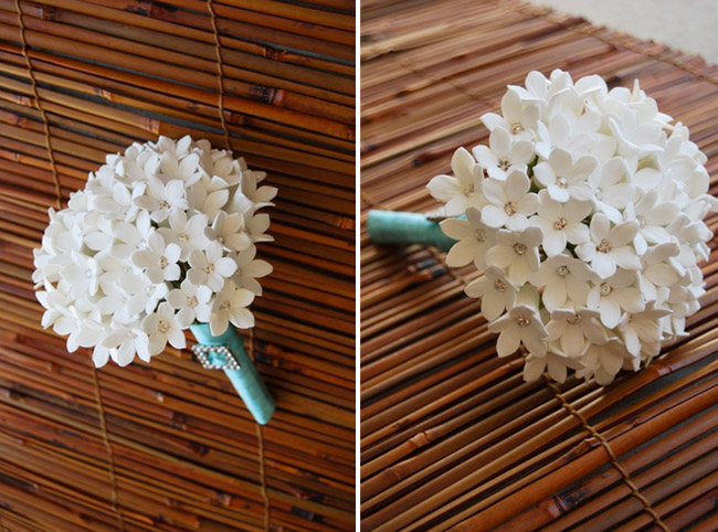 Bridal bouquet composed of white clay stephanotis flowers and Swarovski crystals 